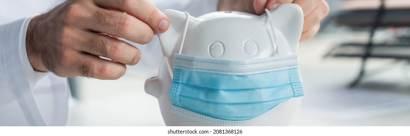 Partial View Of Doctor Putting Medical Mask On Moneybox, Anti-corruption Concept, Banner