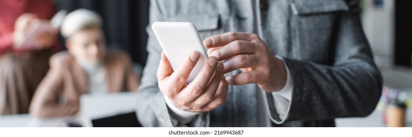 Partial View Of Man Using Mobile Phone In Ad Agency On Blurred Background, Banner