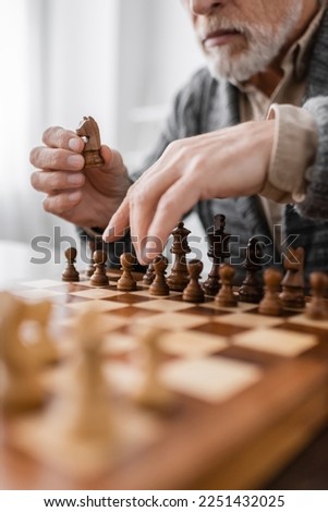 Image, Stock Photo Boy of primary school age plays chess