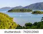 Partial view, Shute Harbour, islands and Conway National Park, from the mainland at Shute Haven, The Whitsundays, Australia. Tropical climate. The Tropics. Copy space. 
