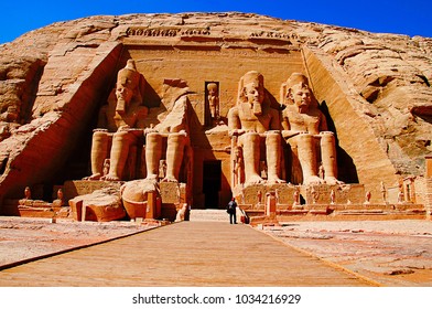 Partial view of two massive rock temples, The twin temples were originally carved out of the mountainside during the reign of Pharaoh Ramesses II - Shutterstock ID 1034216929