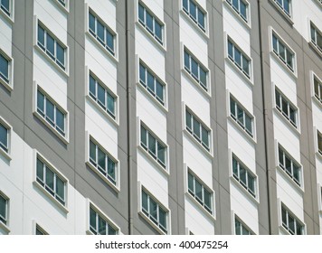 partial view of windows on an apartment building