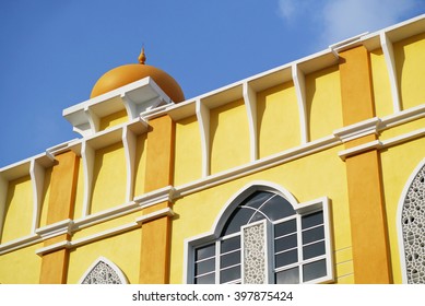 partial view of a yellow building. generic islamic architecture. 