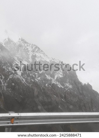 partial whits mountain captured from inside the car