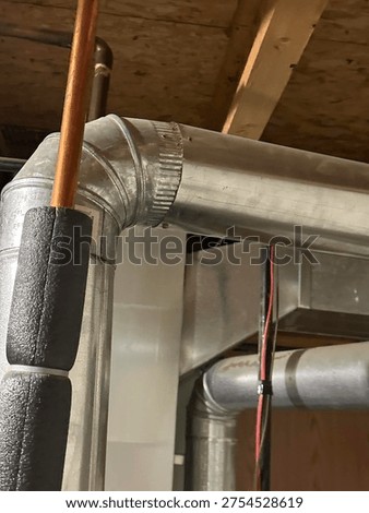 Partially built basement construction space with exposed wood framing concrete floor and unfinished interior structure