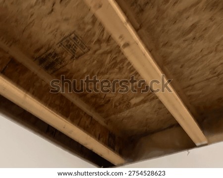 Partially built basement construction space with exposed wood framing concrete floor and unfinished interior structure