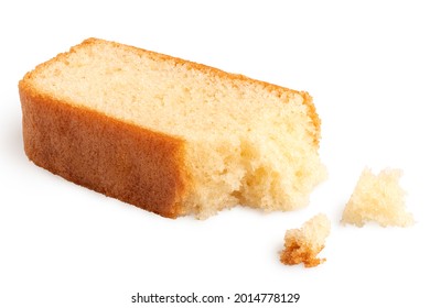 Partially Eaten Slice Of Plain Sponge Cake Lying Flat Isolated On White. With Crumbs.