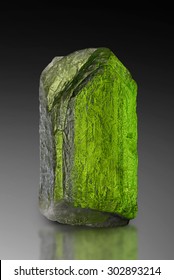 Partially etched flawless peridot crystal from Mogok, Burma. 