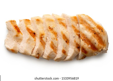 Partially Sliced Grilled Chicken Breast With Grill Marks, Ground Black Pepper And Salt Isolated On White. Top View.