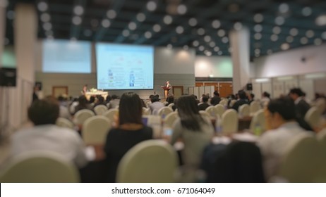 Participants Attending A Conference/symposium In A Meeting Room While The Speaker Is Presenting The Work On The Stage.