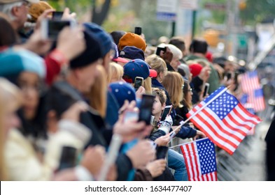 Participants At The Veteran's Day Parade Are Holding US Flag Along 5th Avenue In New York City On November 11, 2019.