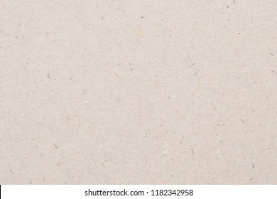 Particleboard, Chipboard Background With Grainy Texture Of Partical Presses Wooden Panel Or OSB Oriented Strand Board In Light Beige Brown Cream Sepia Color