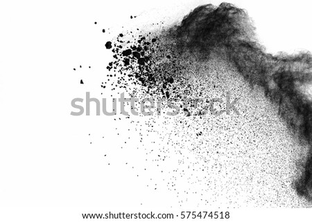 particles of charcoal on white background,abstract powder splatted background,Freeze motion of black powder exploding or throwing black powder.