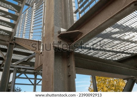 particular structure in galvanized stainless steel, with details of the steel beams and their bolting. anti-intention staircase, pedestrian crossing.