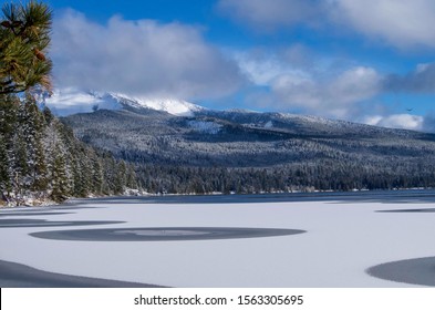 Partly frozen lake in Oregon. This lake is called Diamond Lake and is one of the best kept secrets of the state.