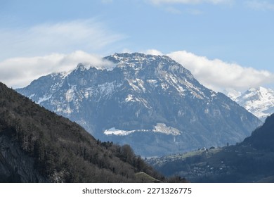 partly snowy Fronalpstock in the swiss alps