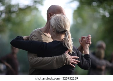 Partner Dance, A Man Leading A Woman In The Dance