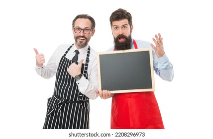 Partners Celebrate Start Up. Catering Business. Welcome On Board. Cafe And Restaurant Opening. Menu Planning. Happy Chef Team In Apron. Bearded Men With Blackboard, Copy Space. Champions In Kitchen