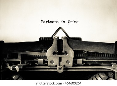 Partners in Crime words typed on a vintage typewriter 
