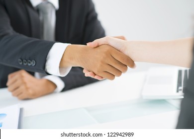 Partners Shaking Hands To Demonstrate Mutual Respect