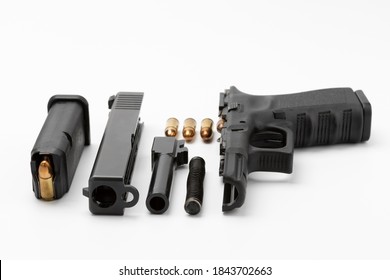 Parts Of Automatic Pistol Handgun With Magazine On White Isolated Background