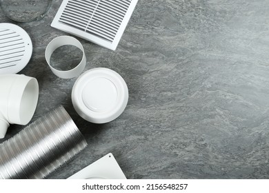 Parts Of Home Ventilation System On Grey Stone Surface, Flat Lay. Space For Text