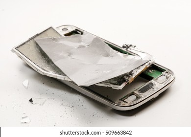 Parts Of Old Broken Phone On White Background. Isolated