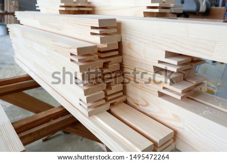 Parts of wooden windows from glued beams from pine with chopped mortise and tenon joints. Close up view, selective focus.