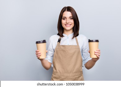 Part-time job person owner cacao routine lifestyle rest break relax leisure pause concept. Portrait of kind friendly pleasant girl giving two big latte isolated on gray background copy-space - Powered by Shutterstock