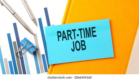 PART-TIME JOB text on sticker on yellow notebook with chart and pen