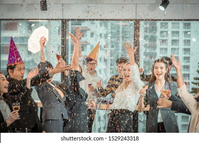 Party activities Celebration Group Friends office have fun with the new year. dance party. The event company for people in the organization has a DJ play music, free ,drink groups, friends. - Shutterstock ID 1529243318