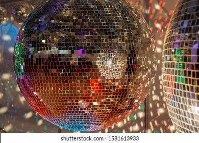 Party background with glowing lights and disco ball - Shutterstock ID 1581613933