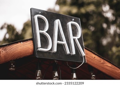 Party bar sign at night