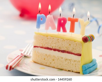 Party Candles on a Slice of Birthday Cake