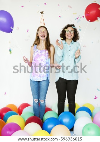 Similar – Image, Stock Photo Young happy couple enjoying a birthday party