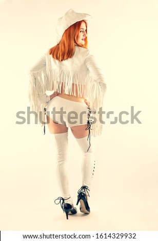 Party in cowboy style girl. beautiful girl in the cowboy style. Back view. Isolated
