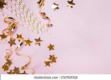 Party decor on pink background. Stock Photo