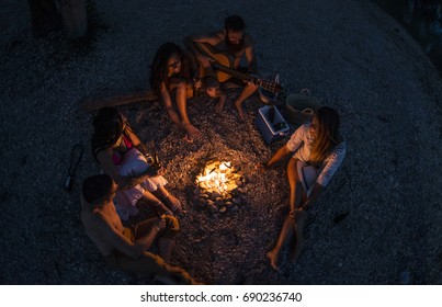 Party Friends Around The Fire