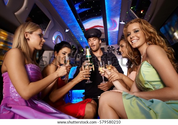 Party fun in\
limousine with attractive\
women.