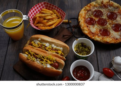 Party Game Day Food Homemade Pizza Hot Dogs Fries Juice And Dips - Super Bowl Food Concept Overhead View