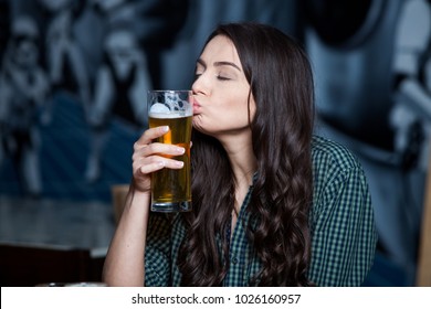 Party Girl. Beautiful Girl Drinking Beer.