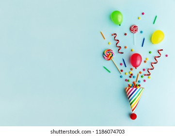 Party Hat With Candy, Balloons And Birthday Candles