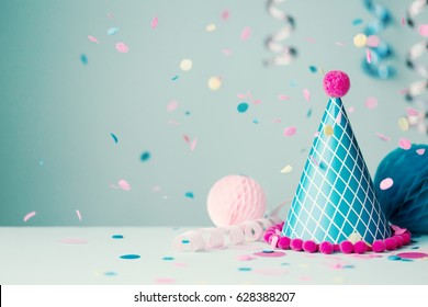 Party hat and falling confetti