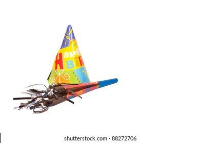 Party Hat And Noise Maker Isolated On White Background