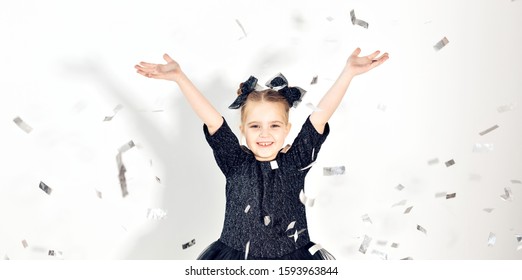 Party, Holidays, New Year And Celebration Concept - Female Child Throwing Confetti.