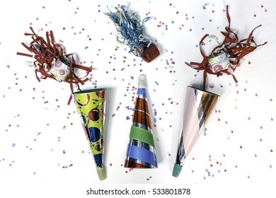 Party Noise Makers Confetti And Horns Photographed From Above 