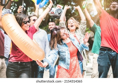 Party People Dancing And Having Fun At Big Party - Friends Enjoying Music And Moving Hands Up At Summer Rooftop Party