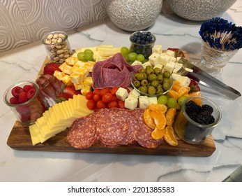 Party Platter, Charcuterie Board With Salami Olives And A Meat Rose On Wooden Platter, Fruit And Cheese Tray.