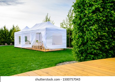 Party Tent - White Garden Party Or Wedding Entertainment Tent In Modern Garden