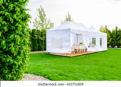 Party Tent - White Garden Party Or Wedding Entertainment Tent In Modern Garden